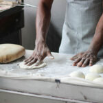 Baker kneading maida dough