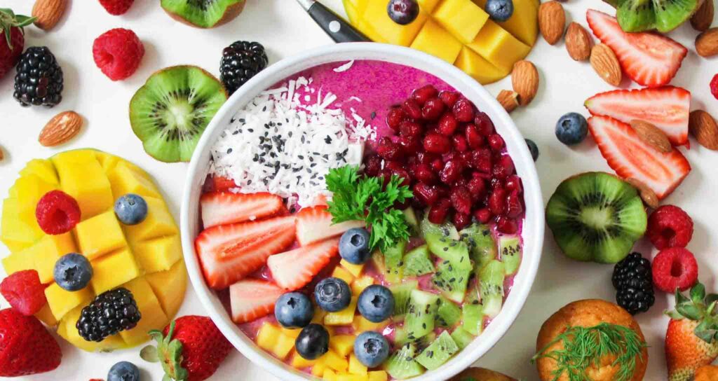 Smart Eating fruit bowl with berries, kiwi, and almonds